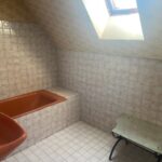 Salle de bain d'une maison individuelle avant intervention de MerciRenov